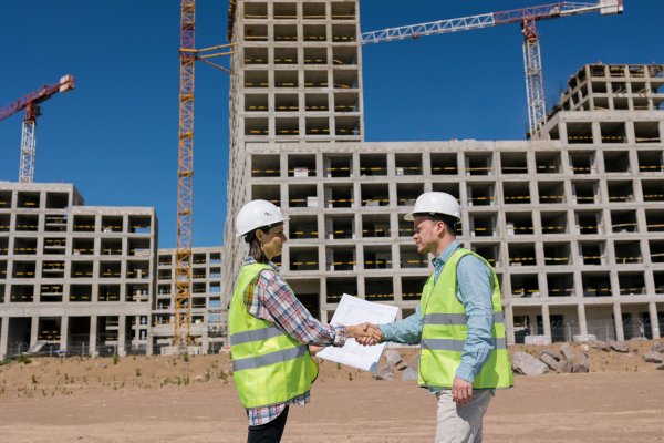looking-at-the-construction-plan-at-the-constructi-2023-11-27-05-32-52-utc-min