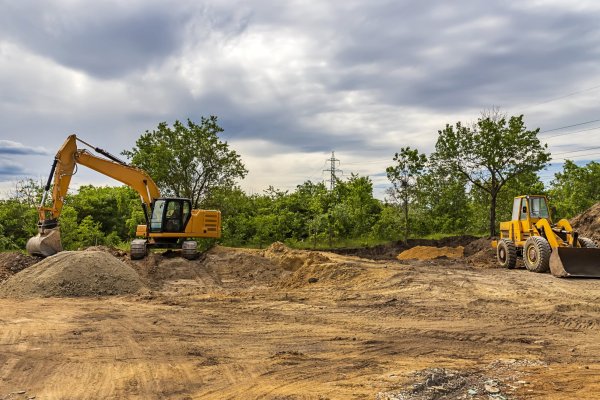 parked-excavators-at-the-construction-site-after-2023-11-27-05-32-29-utc-min